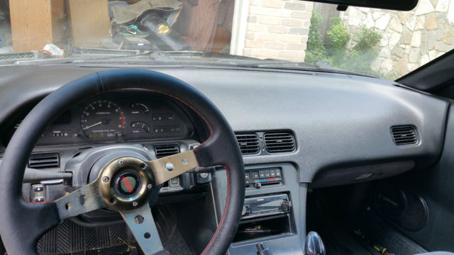 1990 gray Nissan 240SX coupe