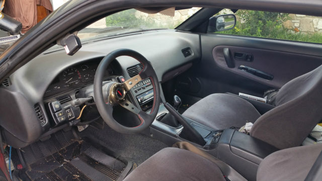 1990 gray Nissan 240SX coupe