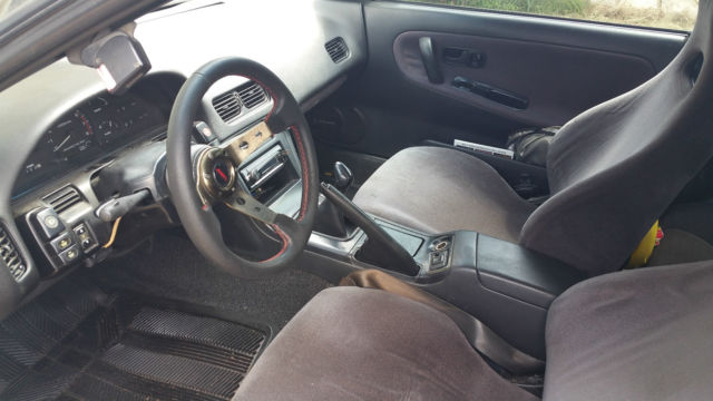 1990 gray Nissan 240SX coupe