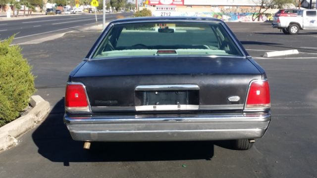 1990 Black Ford Crown Victoria Sedan
