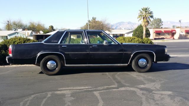 1990 Black Ford Crown Victoria Sedan