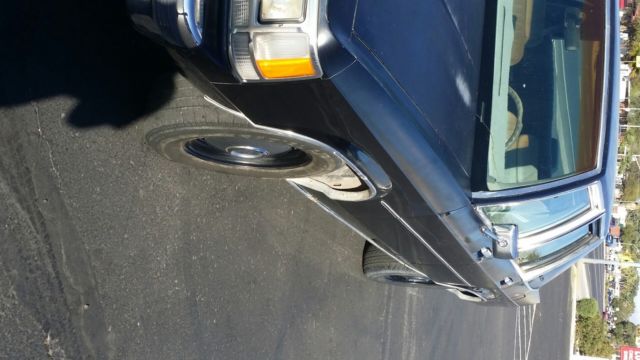 1990 Black Ford Crown Victoria Sedan