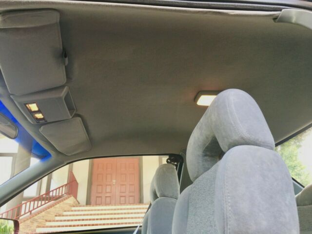 1990 Red Chevrolet Beretta Coupe