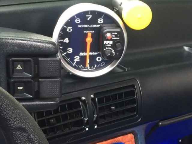 1990 Black and blue Ford Mustang