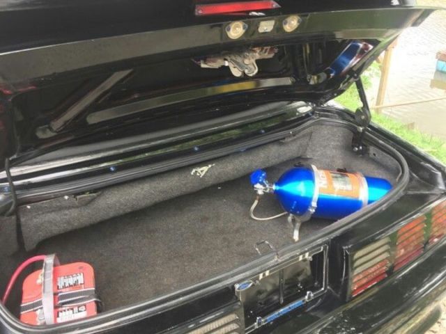1990 Black and blue Ford Mustang