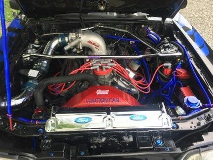 1990 Black and blue Ford Mustang