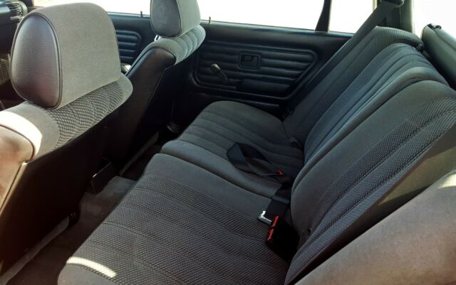 1990 Red BMW 3-Series Wagon