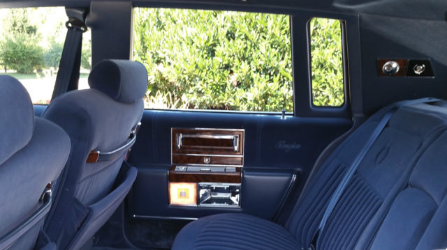 1990 White Cadillac Brougham