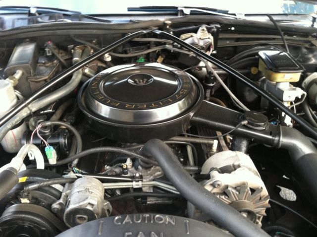 1990 White Cadillac Brougham