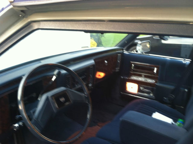 1990 White Cadillac Brougham