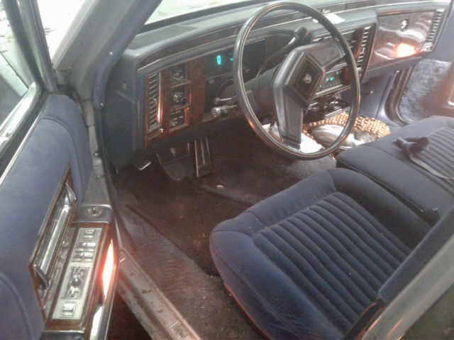 1990 Silver Chevrolet Brougham Hearse
