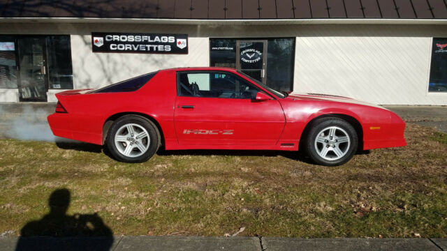 1990 red Chevrolet Camaro Coupe