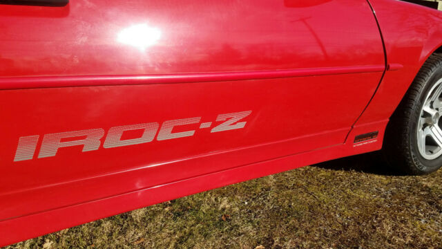 1990 red Chevrolet Camaro Coupe