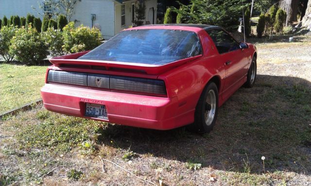 1990 Red Pontiac Firebird Coupe