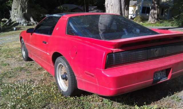 1990 Red Pontiac Firebird Coupe