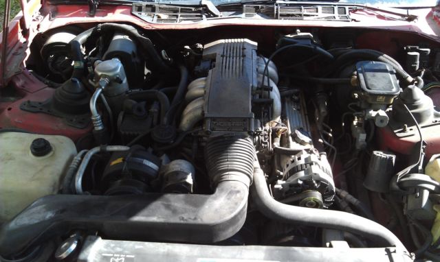 1990 Red Pontiac Firebird Coupe