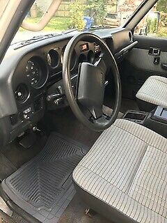 1990 Silver and White Toyota Land Cruiser Wagon