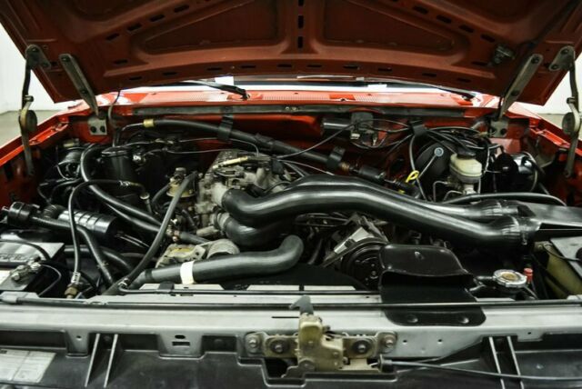 1990 Red Ford Bronco --