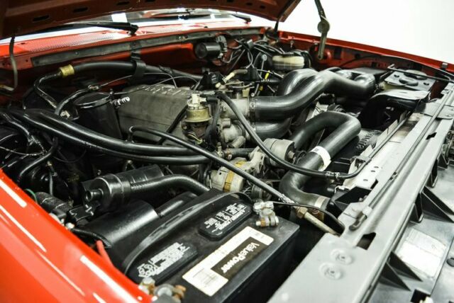 1990 Red Ford Bronco --