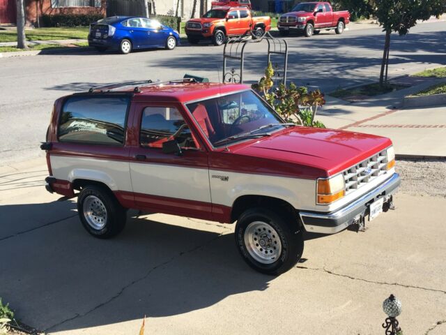 1990 RED WHITE Ford Bronco II 2-door