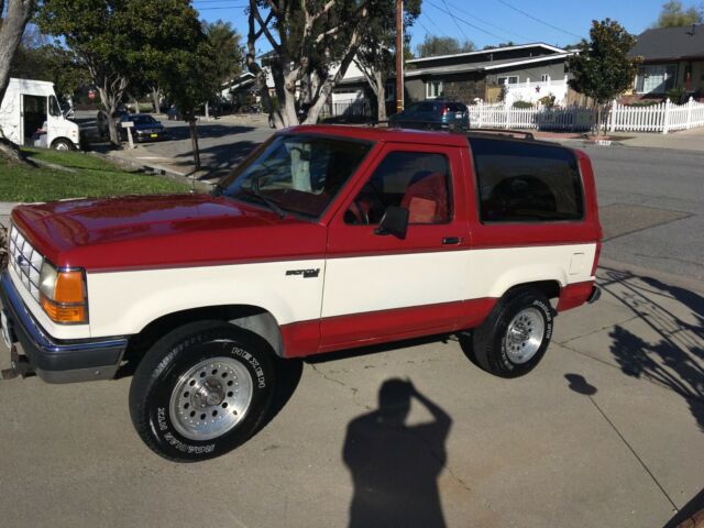 1990 RED WHITE Ford Bronco II 2-door