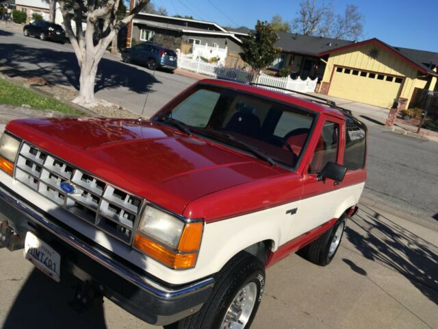 1990 RED WHITE Ford Bronco II 2-door
