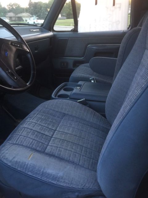 1990 blue/white Ford Bronco