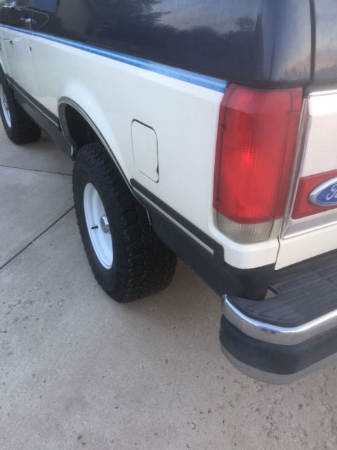 1990 blue/white Ford Bronco