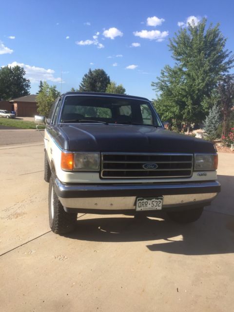 1990 blue/white Ford Bronco