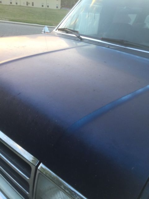 1990 blue/white Ford Bronco