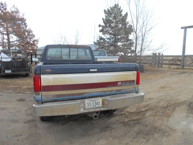 1990 Red Ford F-150 Standard Cab Pickup