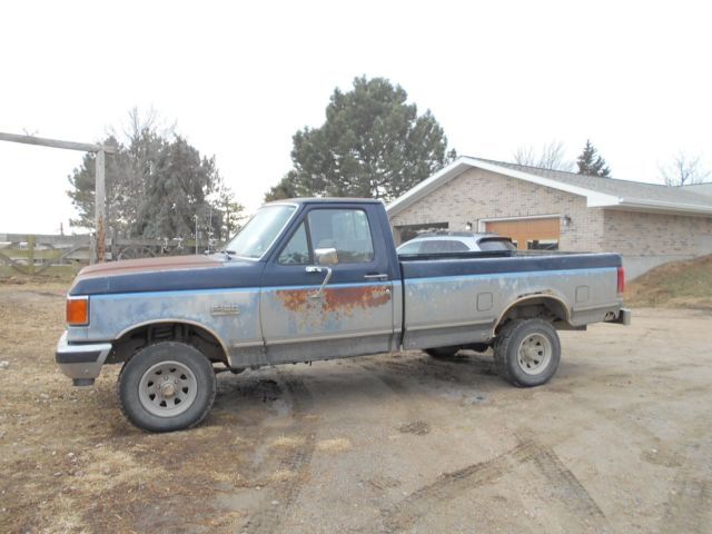 1990 Red Ford F-150 Standard Cab Pickup