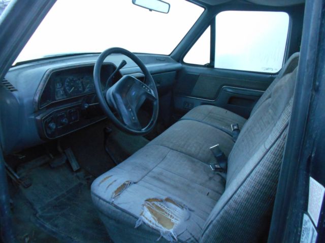 1990 Red Ford F-150 Standard Cab Pickup