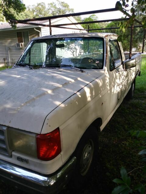 1990 White Ford F-150 pick up