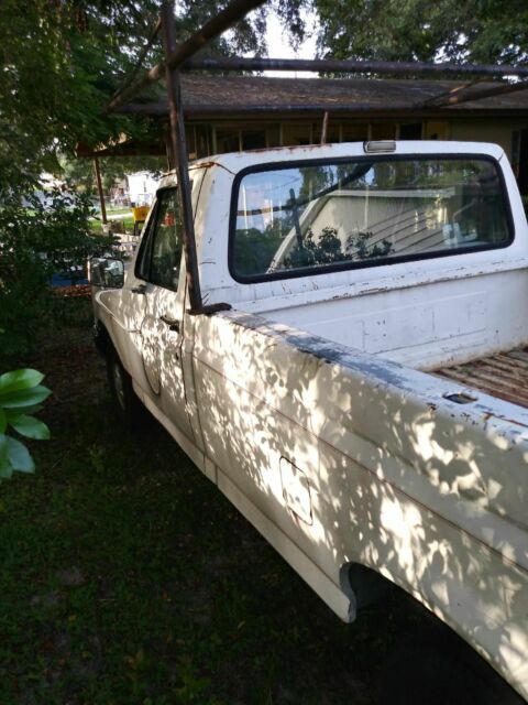 1990 White Ford F-150 pick up