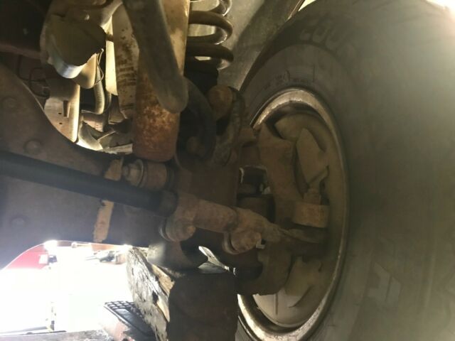 1990 Red Ford F-150 Standard Cab Pickup