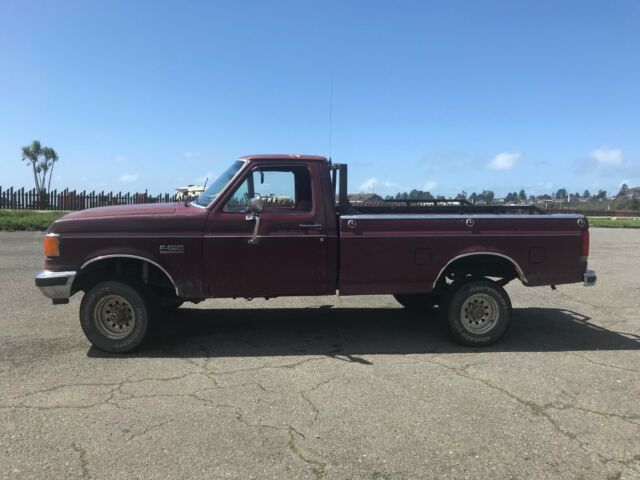 1990 Red Ford F-150 Standard Cab Pickup