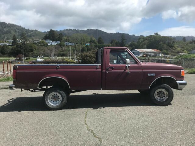 1990 Red Ford F-150 Standard Cab Pickup