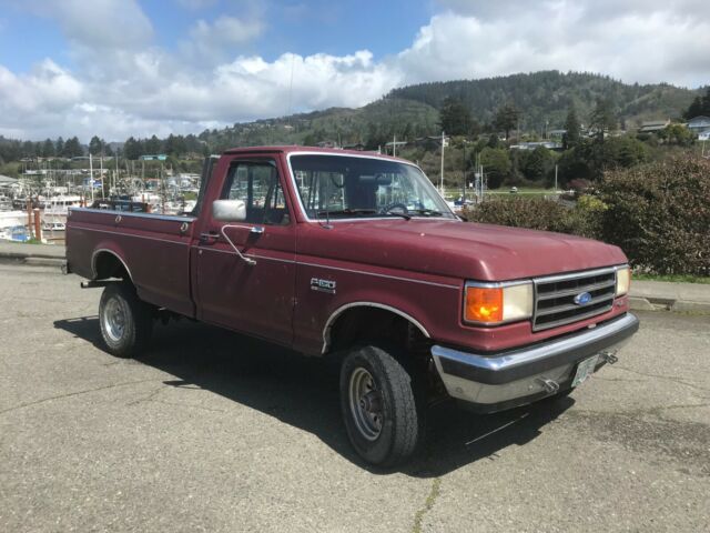 1990 Red Ford F-150 Standard Cab Pickup