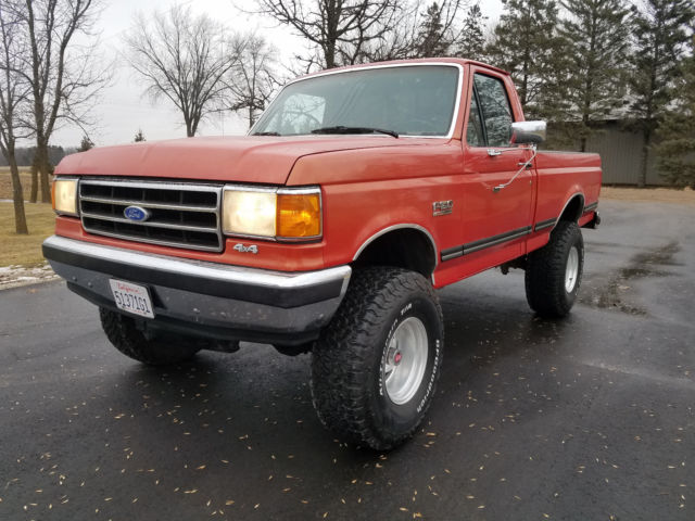 1990 Orange Ford F-150 Standard Cab Pickup