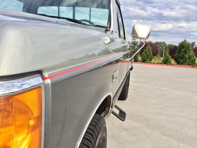 1990 grey Ford F-250 single cab pick up