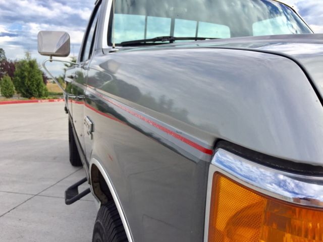 1990 grey Ford F-250 single cab pick up