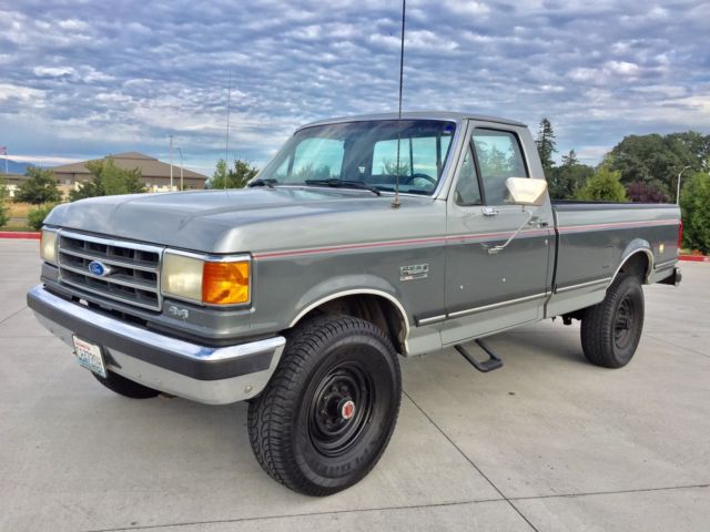 1990 grey Ford F-250 single cab pick up