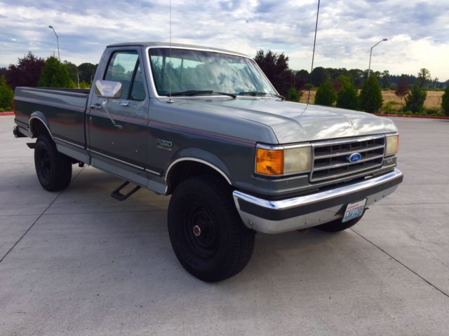 1990 grey Ford F-250 single cab pick up