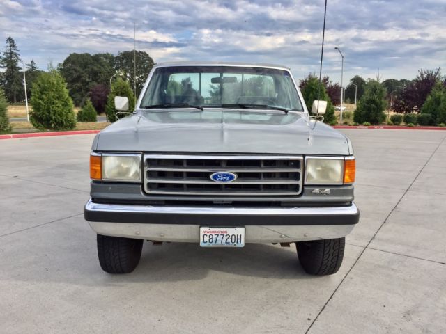 1990 grey Ford F-250 single cab pick up