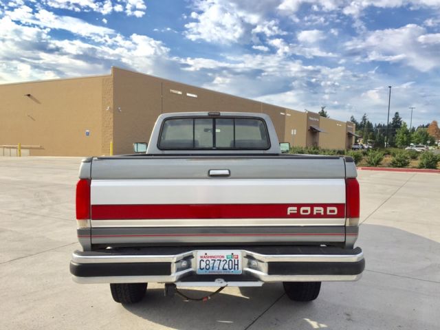 1990 grey Ford F-250 single cab pick up