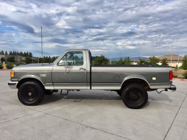 1990 grey Ford F-250 single cab pick up