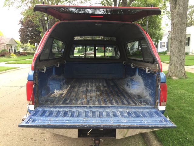 1990 Blue Ford F-250 Extended Cab Pickup