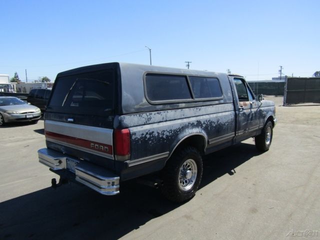 1990 Blue Ford F-250 Pickup Truck