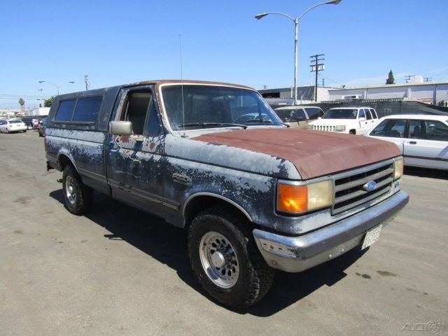 1990 Blue Ford F-250 Pickup Truck